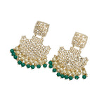 1. "Kundan channbali earrings with green and white pearls offer a regal, timeless allure."
