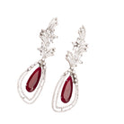 "Light pink zircon earrings offer a delicate sparkle with a serene, elegant touch."
