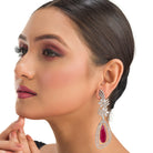 "Light pink zircon earrings offer a delicate sparkle with a serene, elegant touch."
