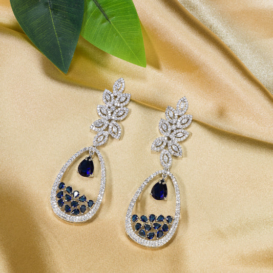 BLUE ZIRCON STUDDED EARRINGS OFFERS A FRESH, DELICATE SPARKLE WITH A HINT OF SERENE ELEGANCE."