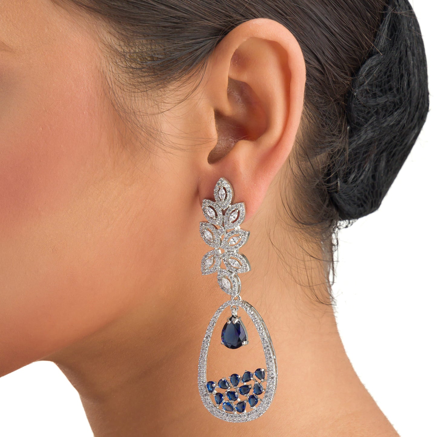 BLUE ZIRCON STUDDED EARRINGS OFFERS A FRESH, DELICATE SPARKLE WITH A HINT OF SERENE ELEGANCE."