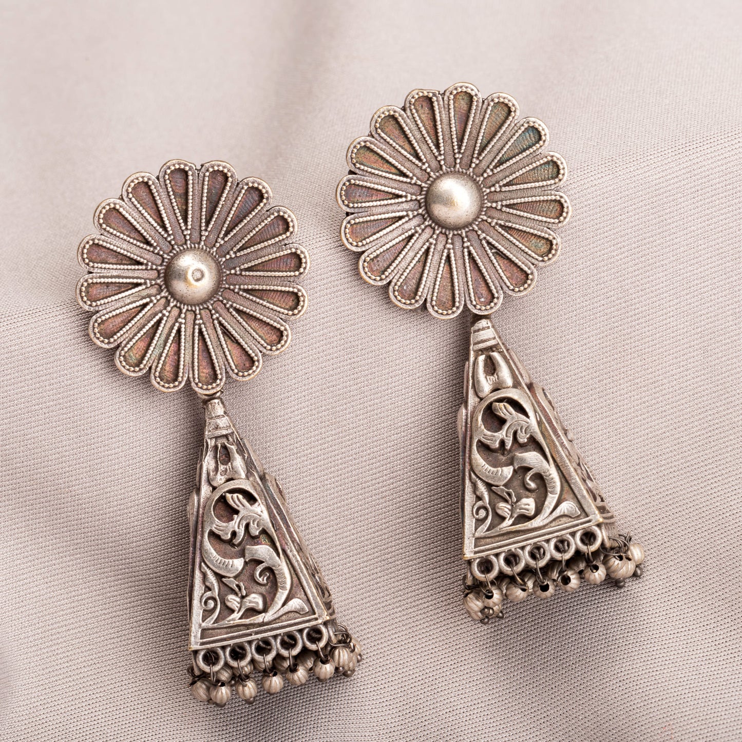 TRENDY OXIDISED EARRINGS OFFER A SLEEK, MODERN EDGE TO ANY OUTFIT."