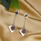 "Trendy oxidized metal dangler earrings add a sleek, modern edge to any outfit."
