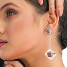 "Trendy oxidized metal dangler earrings add a sleek, modern edge to any outfit."
