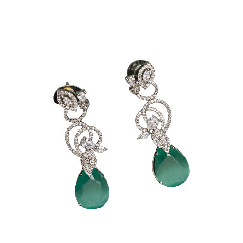 1. "Light green zircon earrings sparkle delicately, adding serene elegance to your look."
