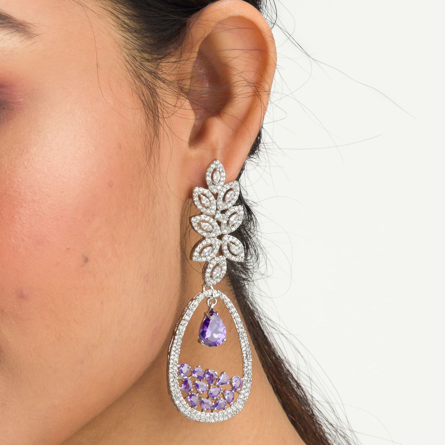 PURPLE AND WHITE COLOURED  ZIRCON DANGLER EARRINGS EXUDE A DEEP, CAPTIVATING SPARKLE