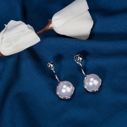 TRENDY PEARL STUDDS EARRING.