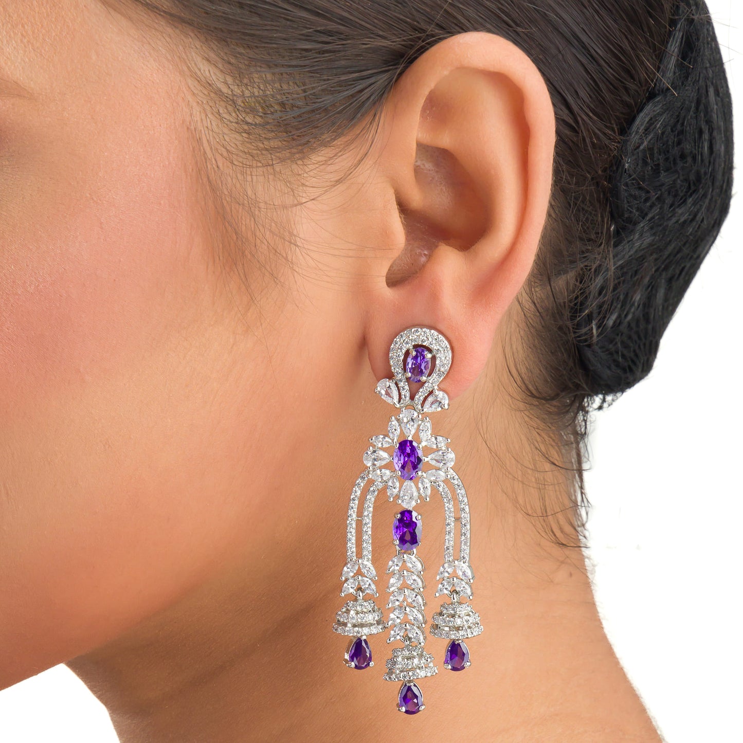 BLUE AND WHITE ZIRCON STUDDED  DANGLER EARRINGS EXUDE A DEEP, CAPTIVATING SPARKLE