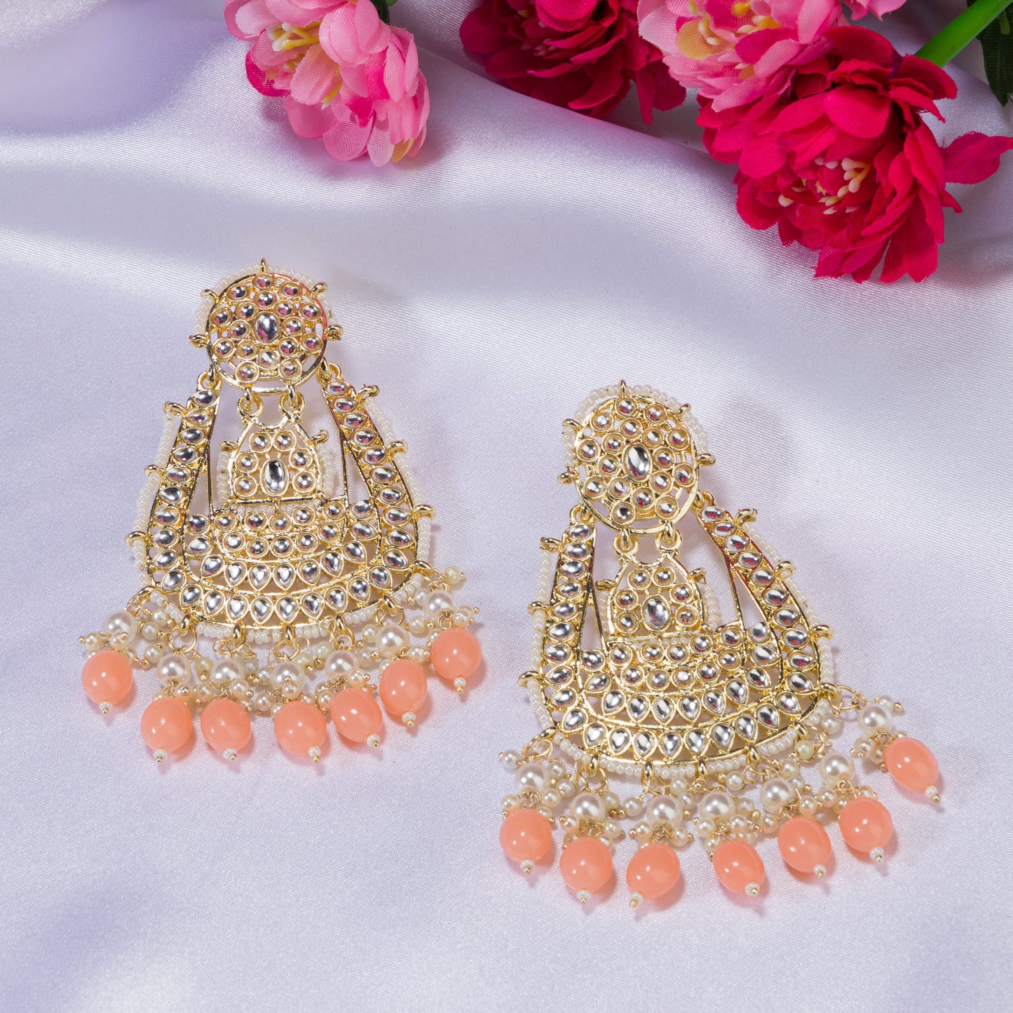 SALMON COLOUR PEARLS STUDDED KUNDAN BIG EARRINGS MAKE A BOLD, ELEGANT STATEMENT.