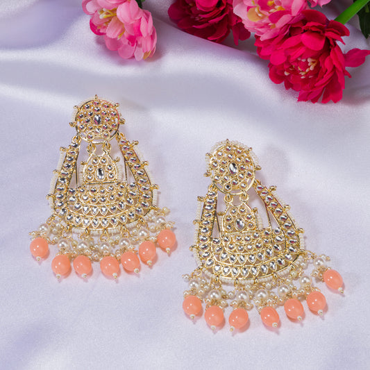 SALMON COLOUR PEARLS STUDDED KUNDAN BIG EARRINGS MAKE A BOLD, ELEGANT STATEMENT.