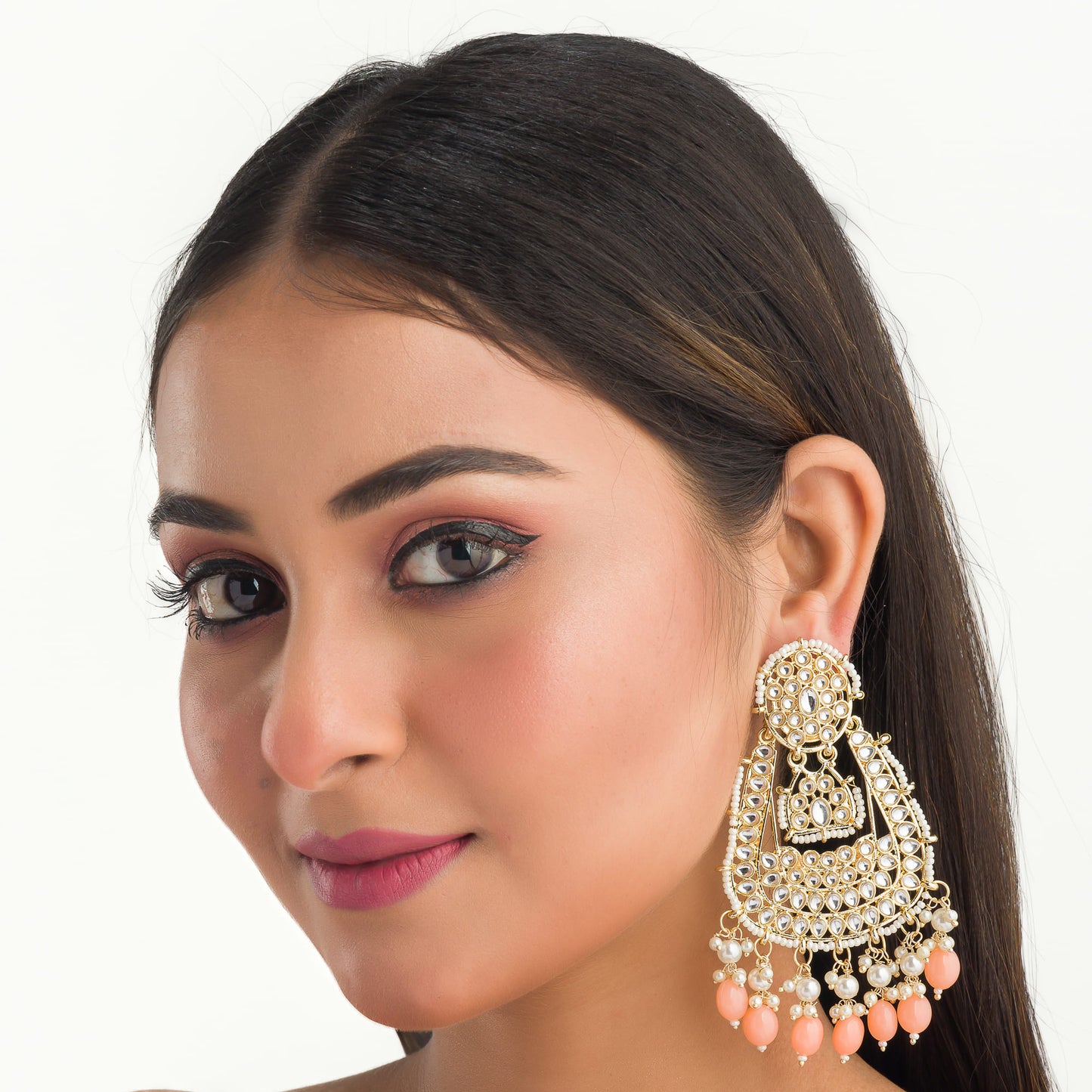 SALMON COLOUR PEARLS STUDDED KUNDAN BIG EARRINGS MAKE A BOLD, ELEGANT STATEMENT.