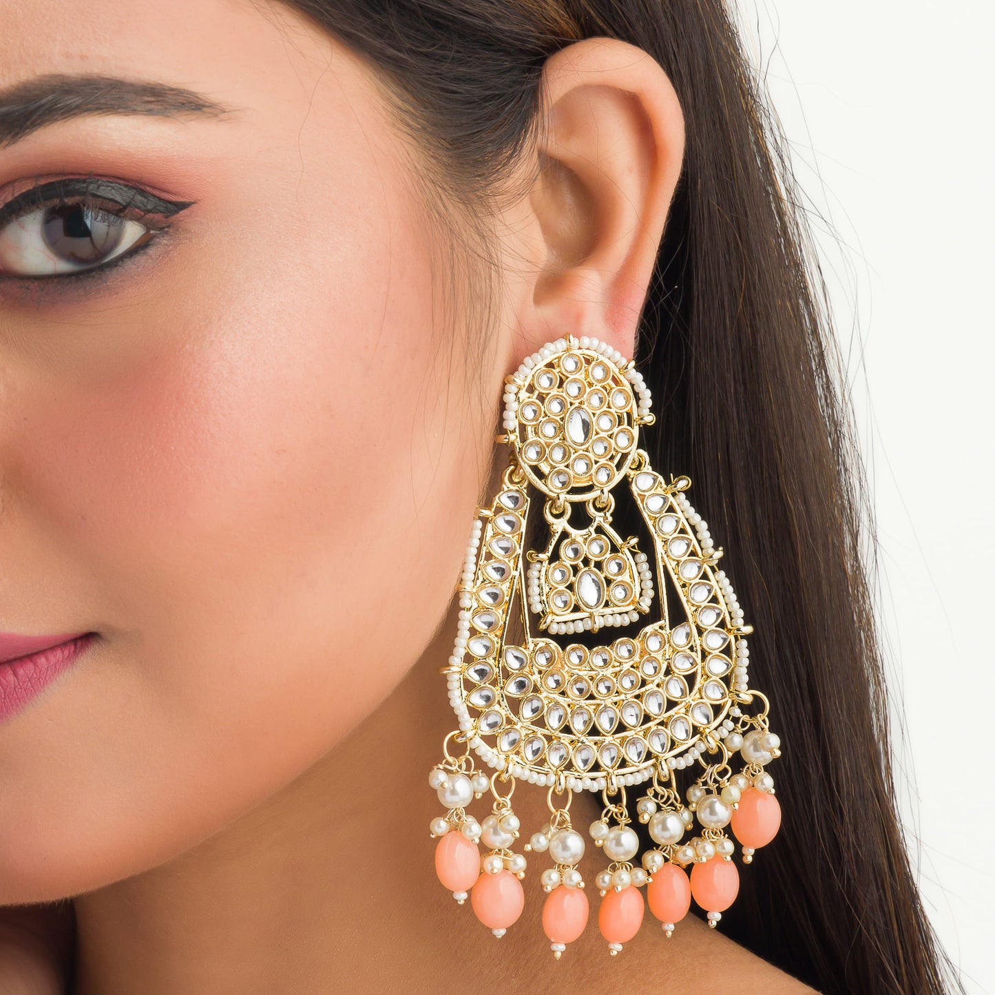 SALMON COLOUR PEARLS STUDDED KUNDAN BIG EARRINGS MAKE A BOLD, ELEGANT STATEMENT.