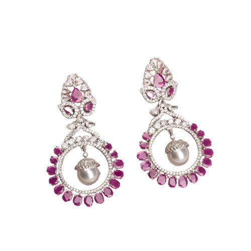 "Pink zircon dangler earrings offer fresh sparkle with a serene, elegant touch."
