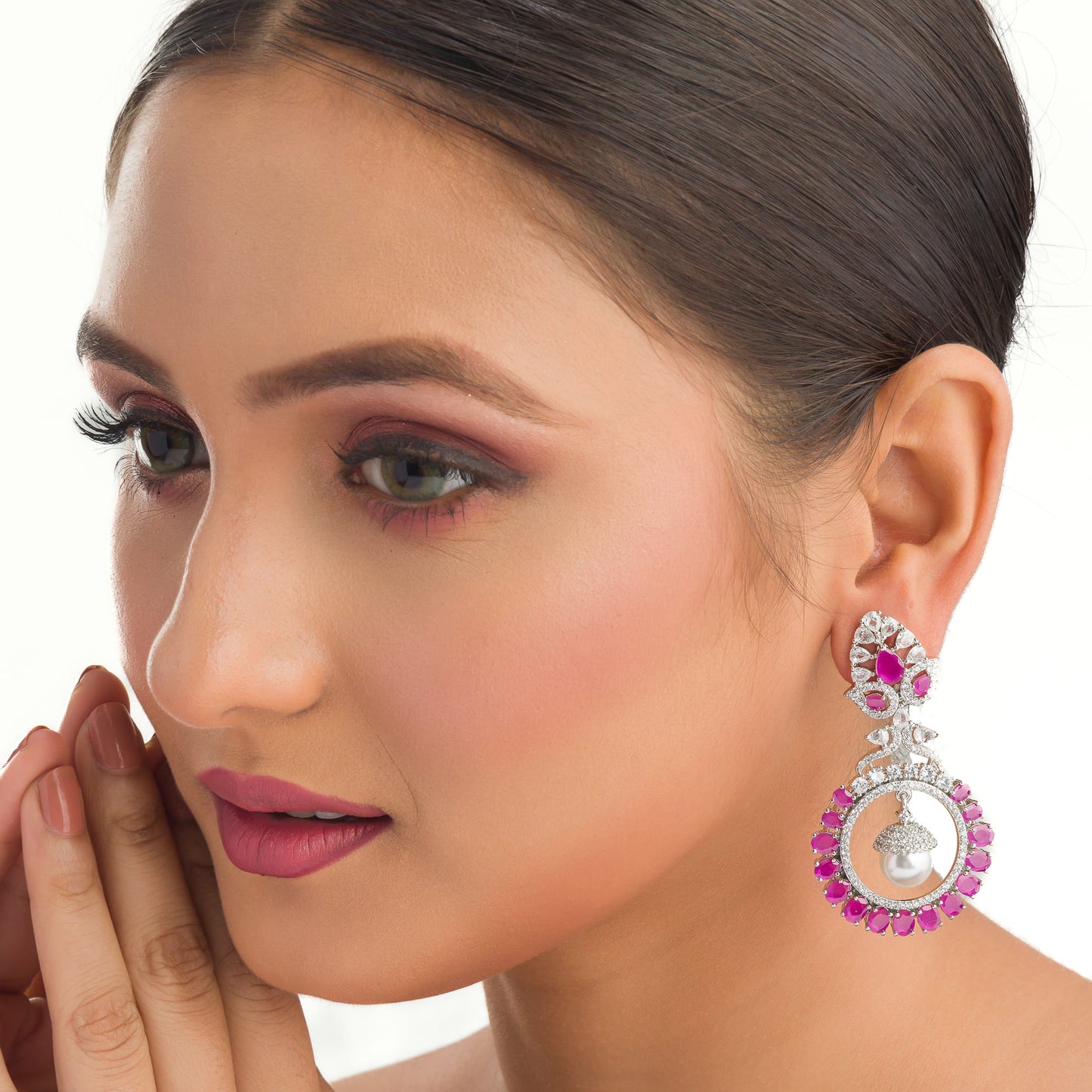 "PINK ZIRCON STUDDED EARRINGS OFFERS A FRESH, DELICATE SPARKLE WITH A HINT OF SERENE ELEGANCE."