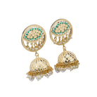 "Gold-tone jhumka with a green accent adds a vibrant twist to traditional style."
