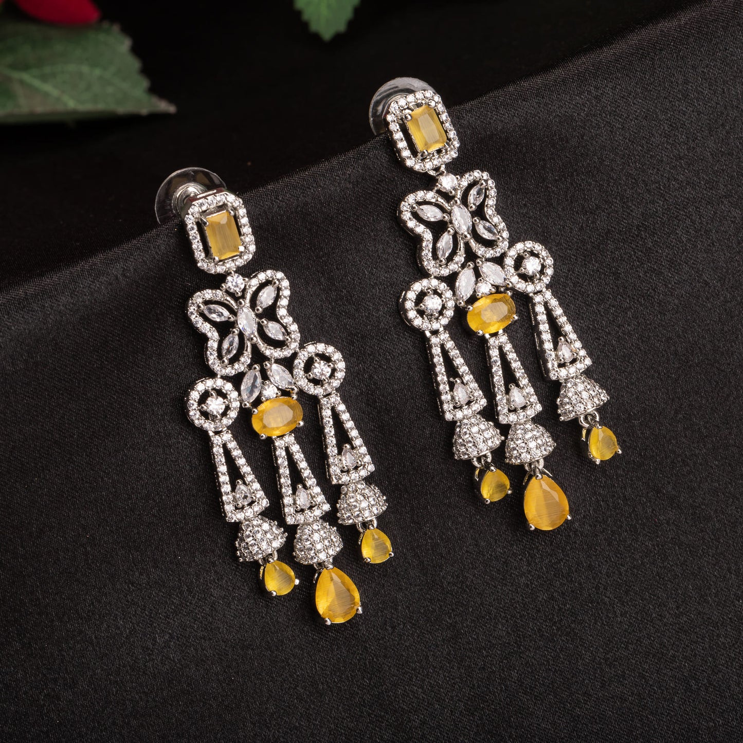 YELLOW ZIRCON EARRINGS OFFER A BRIGHT, SUNNY SPARKLE WITH A TOUCH OF VIBRANT ELEGANCE.