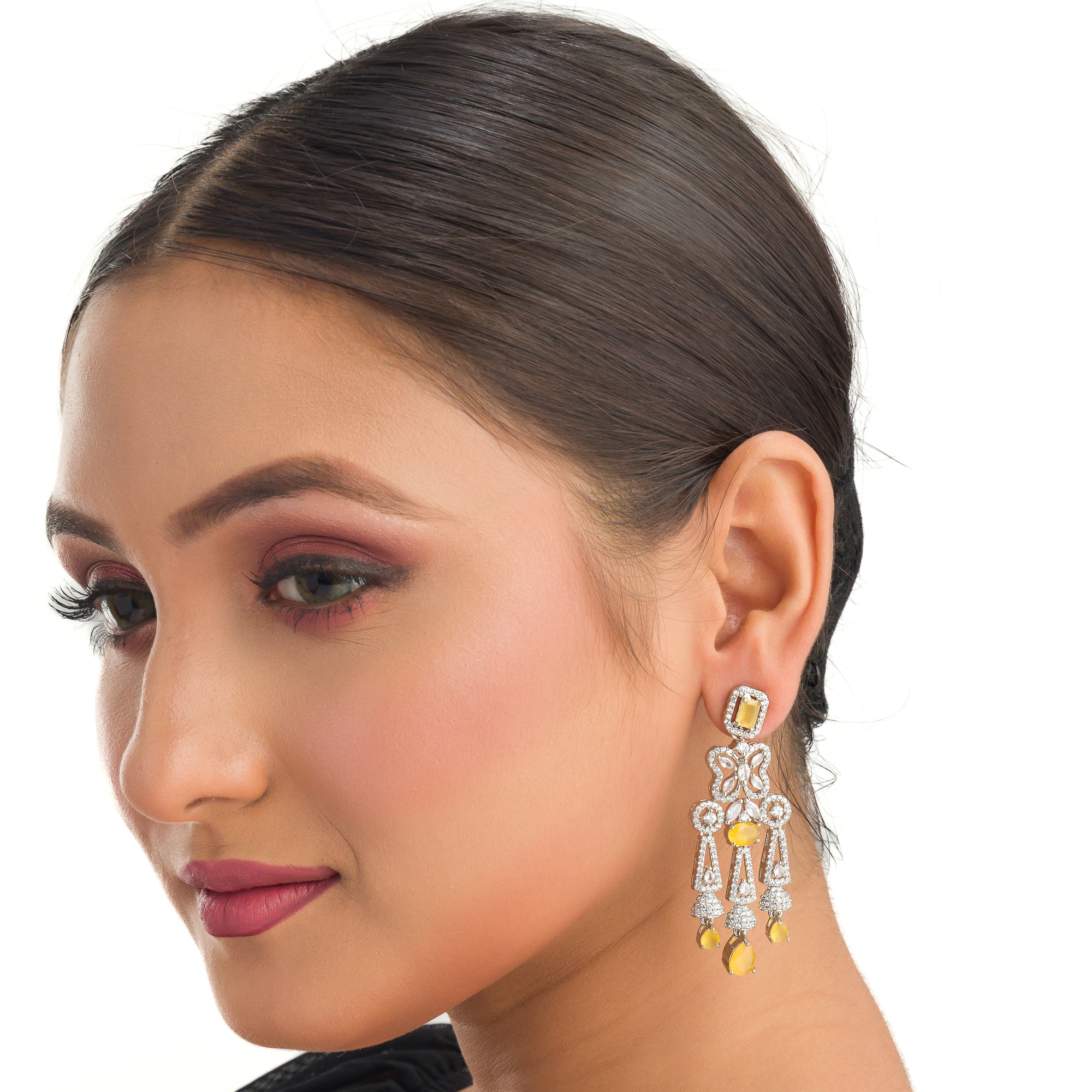 1. "Yellow zircon earrings add a bright, sunny sparkle with vibrant, elegant charm."
