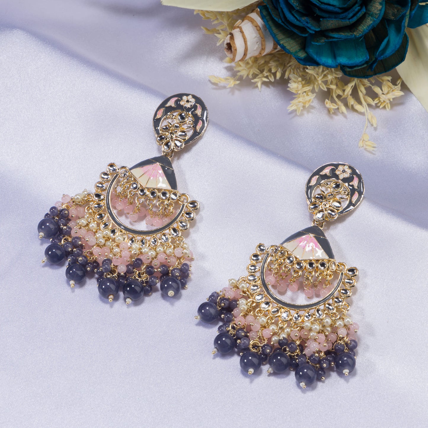 PINK AND WHITE COLOURED DESIGN ZIRCON JHUMKAS COMBINE VIBRANT COLOR WITH CLASSIC ELEGANCE.