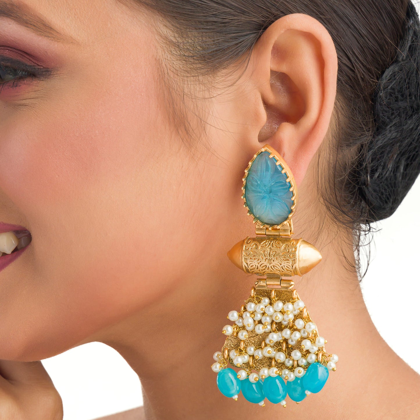 BLUE EARRINGS WITH GOLD-TONE POLISH COMBINE VIBRANT COLOR WITH A WARM, SOPHISTICATED FINISH.