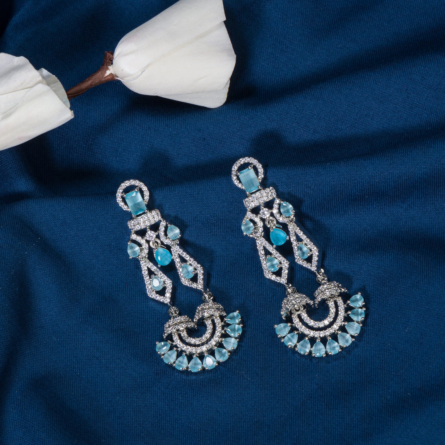 BLUE ZIRCON EARRINGS OFFER A BRILLIANT AND CAPTIVATING SPARKLE WITH A RICH, VIBRANT HUE.