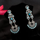 1. "Blue zircon earrings shine with captivating sparkle and a rich, vibrant hue for a stunning effect."
