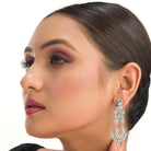 1. "Blue zircon earrings shine with captivating sparkle and a rich, vibrant hue for a stunning effect."
