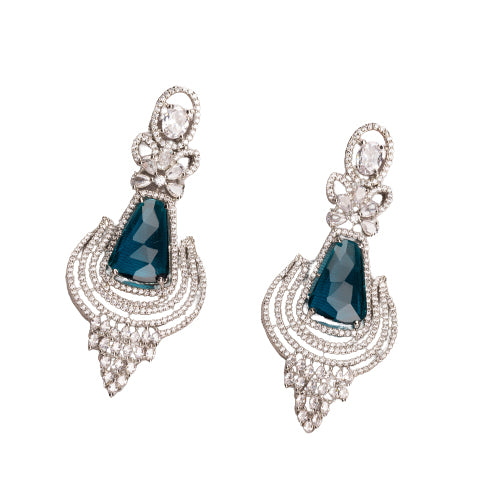 "Teal zircon earrings offer a striking, vibrant look with a touch of elegance."
