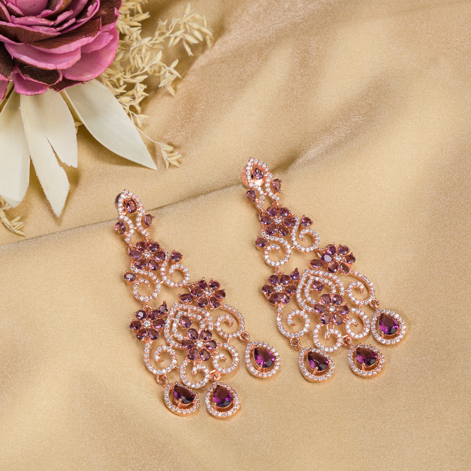 Rose gold zircon long earrings combine modern elegance with sparkling sophistication."
