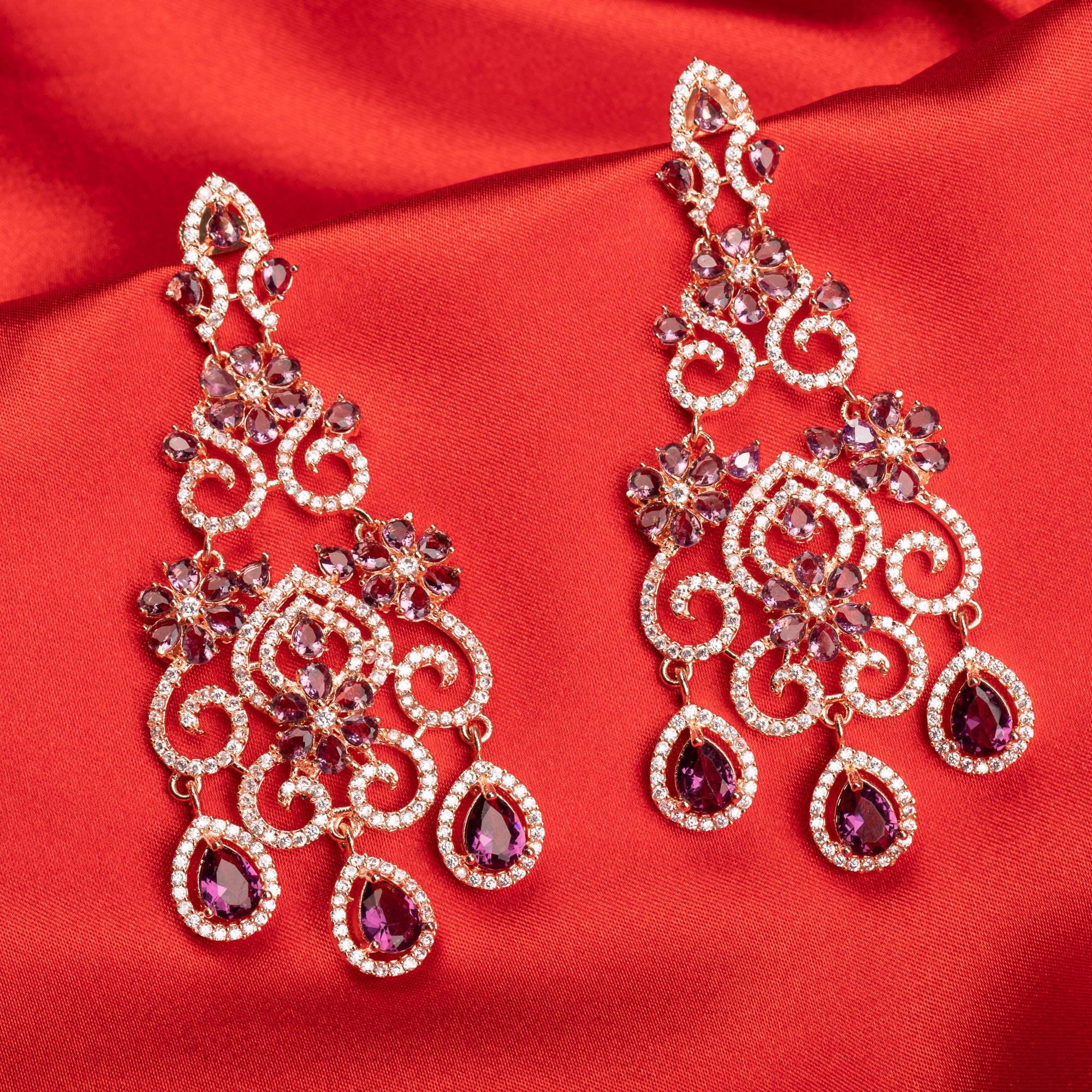 Rose gold zircon long earrings combine modern elegance with sparkling sophistication."
