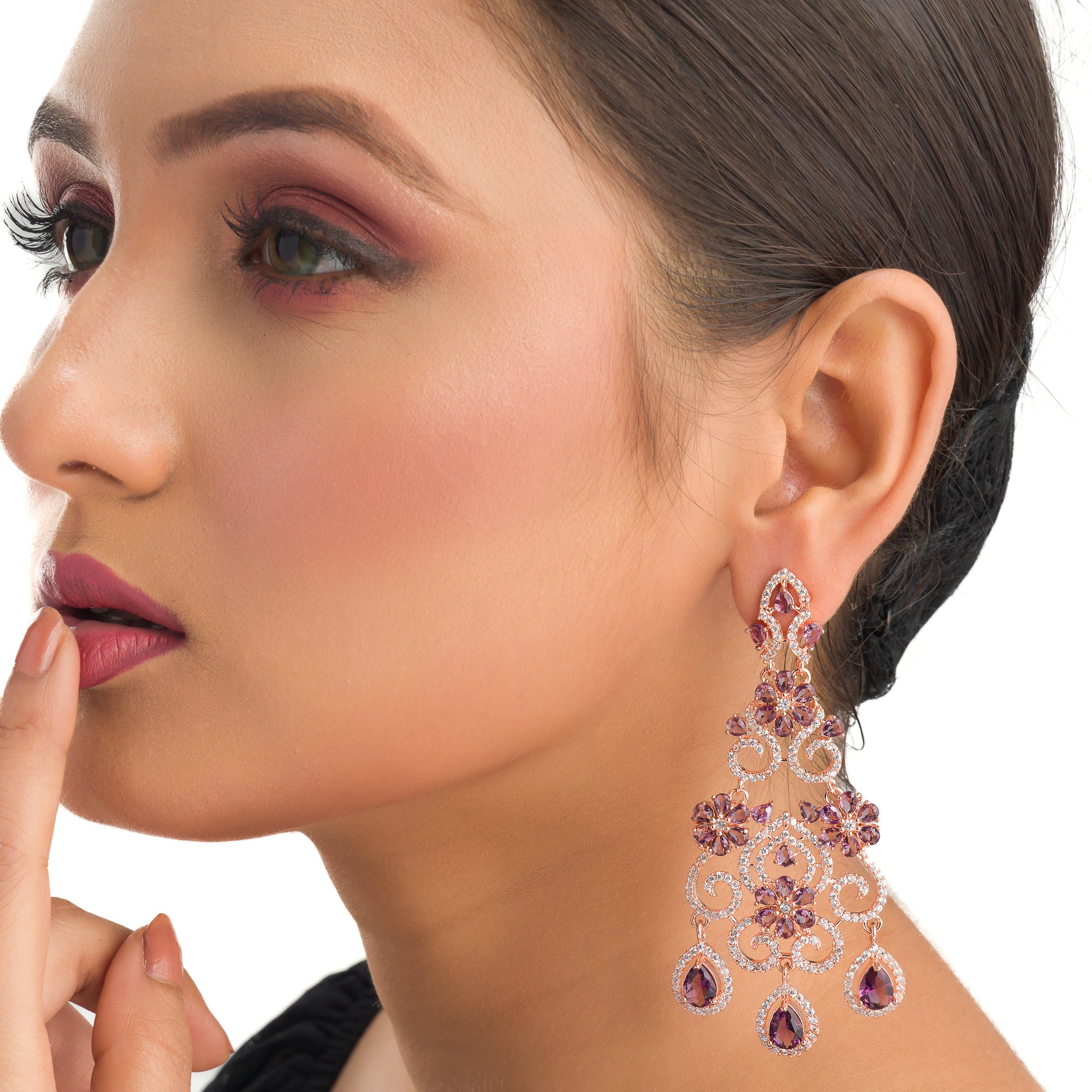 Rose gold zircon long earrings combine modern elegance with sparkling sophistication."
