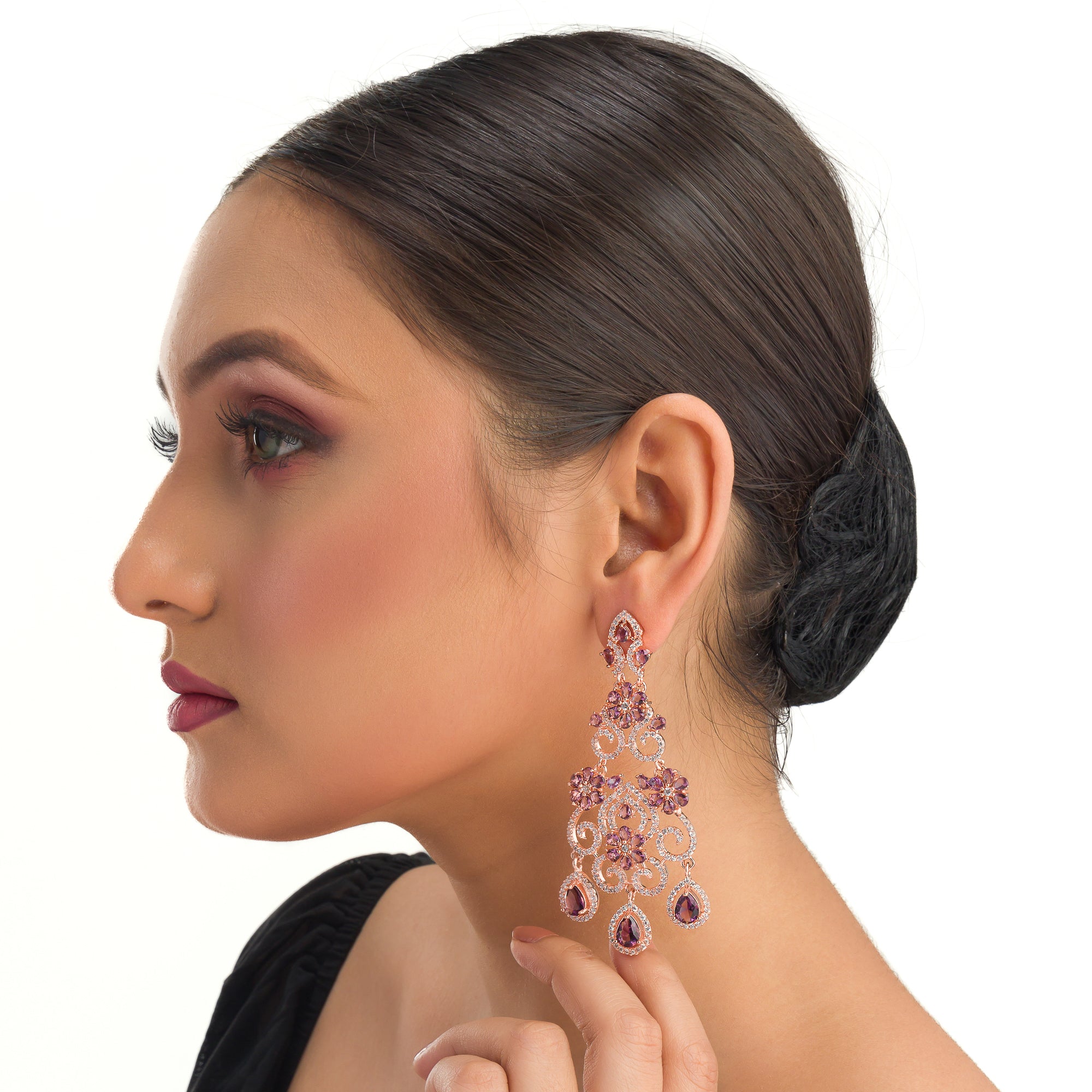 Rose gold zircon long earrings combine modern elegance with sparkling sophistication."
