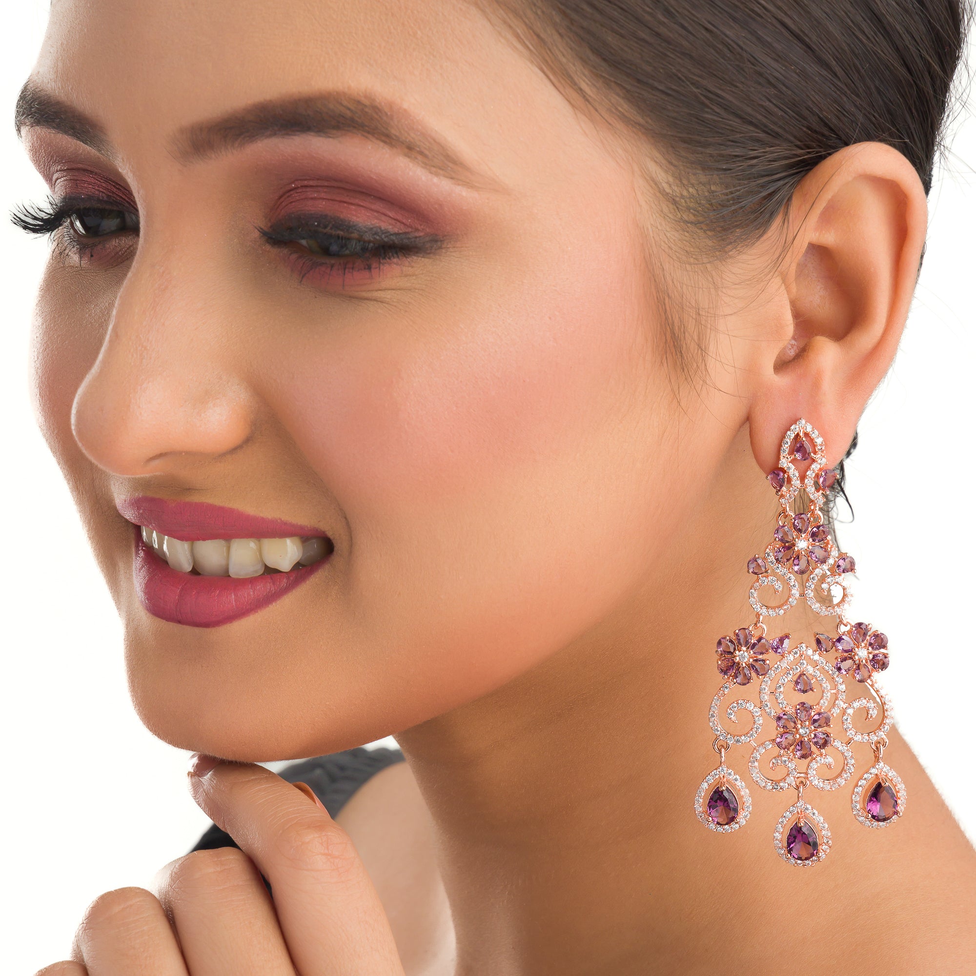 Rose gold zircon long earrings combine modern elegance with sparkling sophistication."
