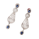 "Navy blue zircon earrings add a vibrant, elegant sparkle to your ensemble."
