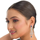 "Navy blue zircon earrings add a vibrant, elegant sparkle to your ensemble."
