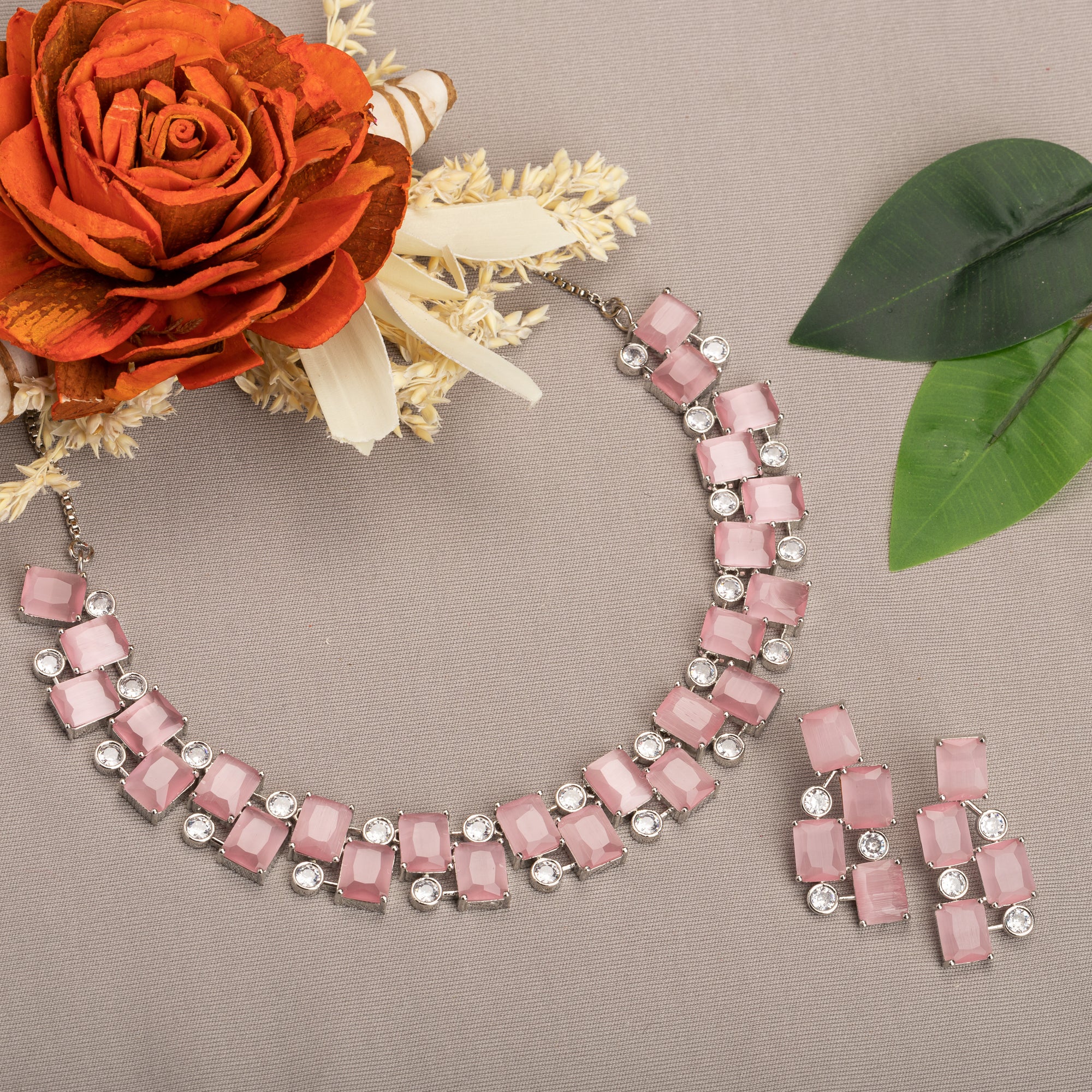 "Pink zircon heavy necklace boasts striking brilliance and bold elegance."
