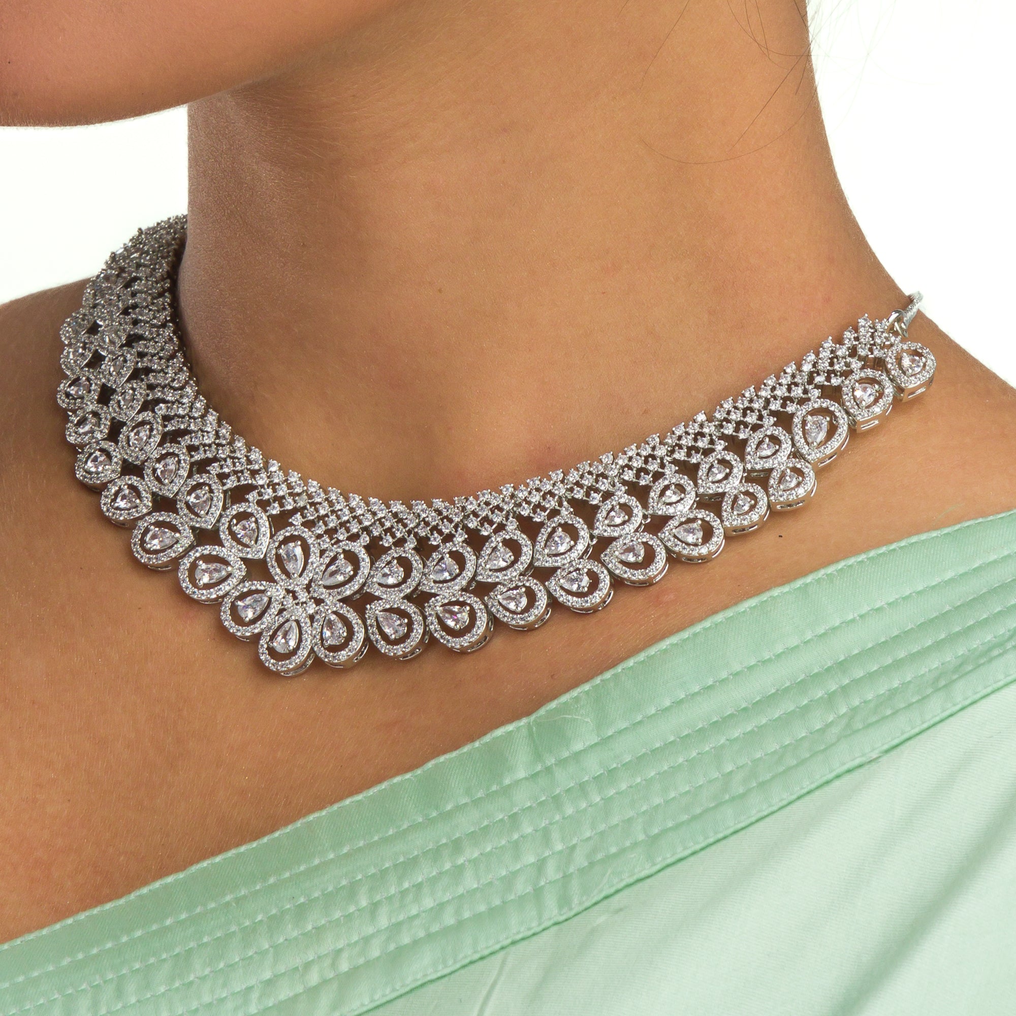 1. "Zircon necklace shines with bold elegance and brilliant clarity."
