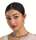 "Pink zircon necklace set features vibrant, elegant charm."
