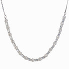 "Delicate zircon necklace with small flower design adds elegance and sparkle."
