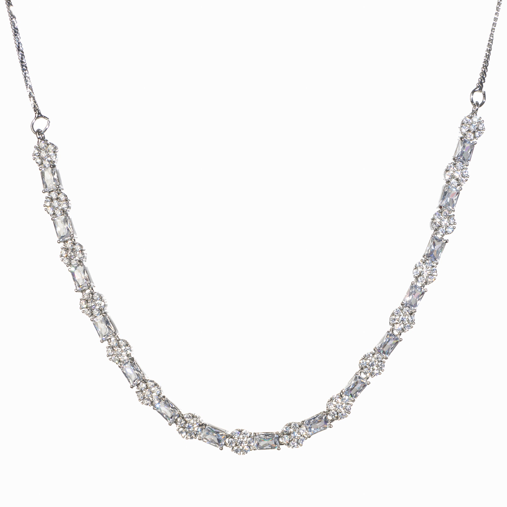 "Delicate zircon necklace with small flower design adds elegance and sparkle."
