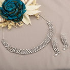 "Zircon necklace with infinity design symbolizes timeless elegance."
