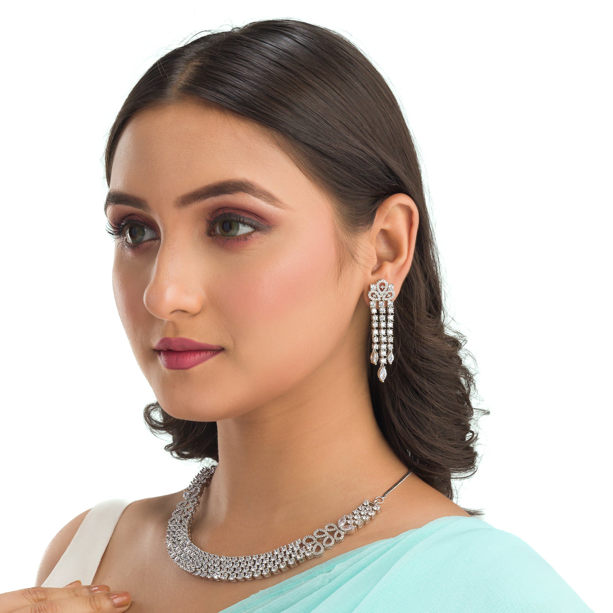 "Zircon necklace with infinity design symbolizes timeless elegance."
