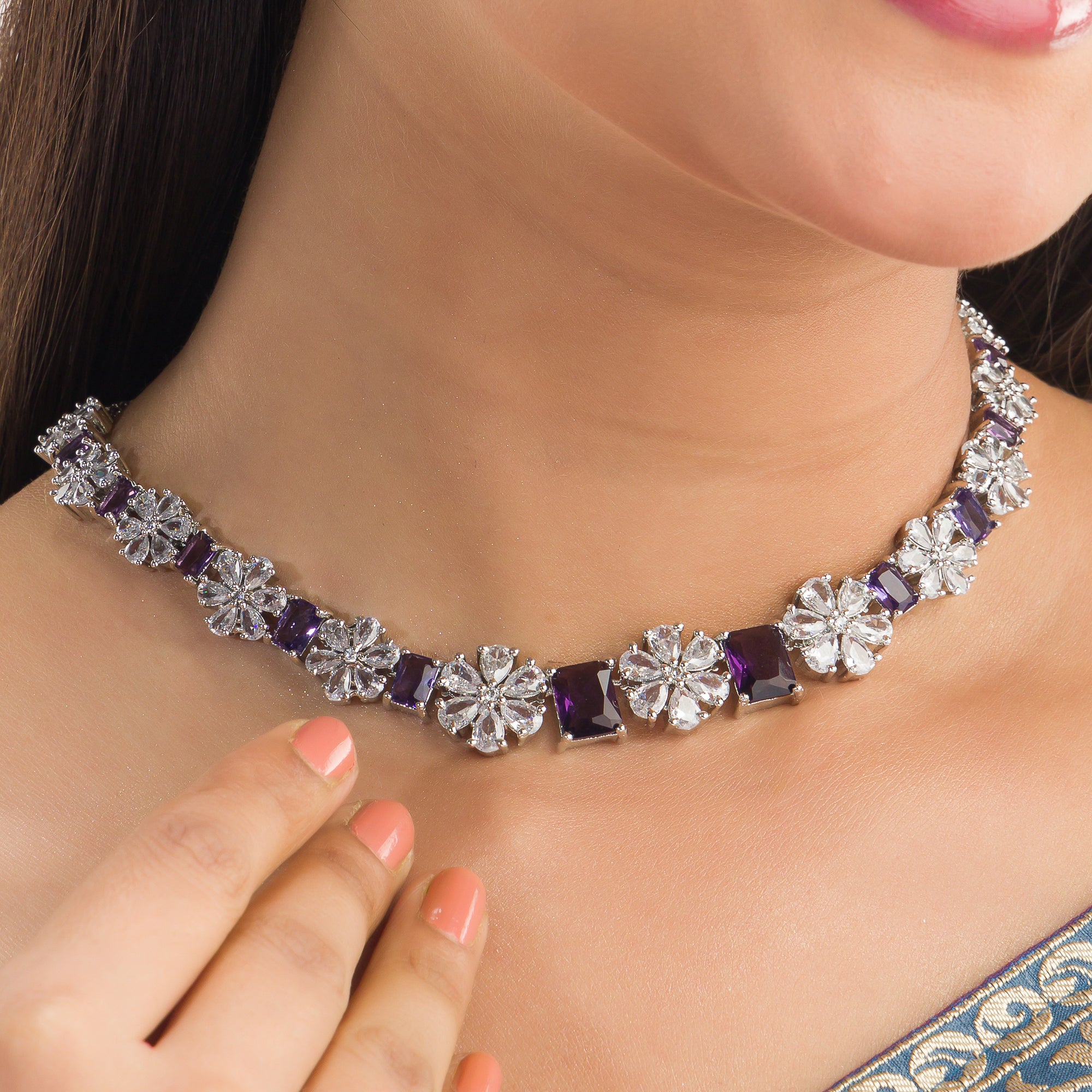 "Navy blue zircon short necklace delivers a sophisticated splash of color and sparkle."
