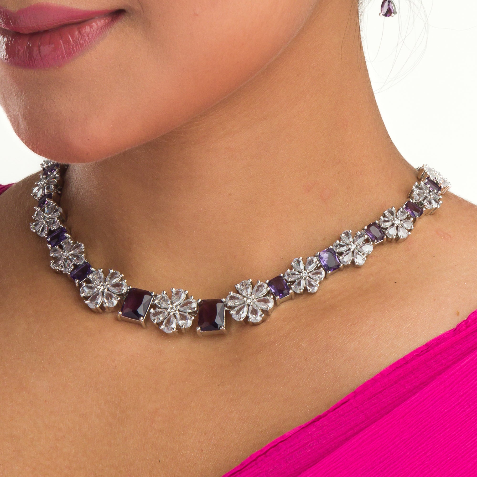 "Navy blue zircon short necklace delivers a sophisticated splash of color and sparkle."
