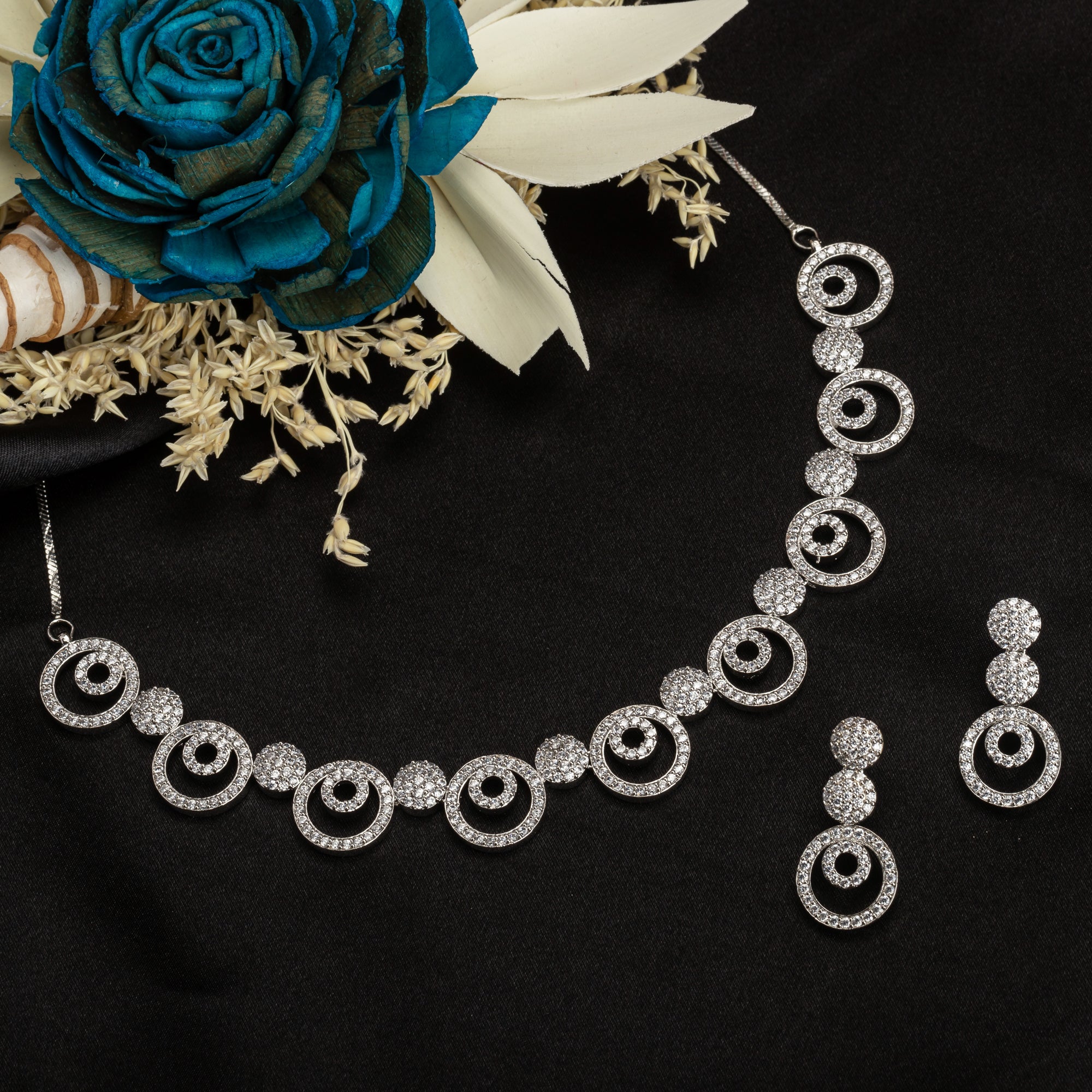 "White zircon necklace exudes classic elegance with sparkling clarity."
