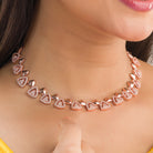 "Triangular rose gold zircon necklace adds sleek, modern sophistication to your look."
