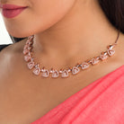 "Triangular rose gold zircon necklace adds sleek, modern sophistication to your look."
