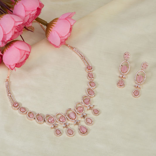 BEAUTIFUL PINK ZIRCON NECKLACE WITH A ROSE GOLD POLISH FOR A CHIC AND ELEGANT TOUCH.