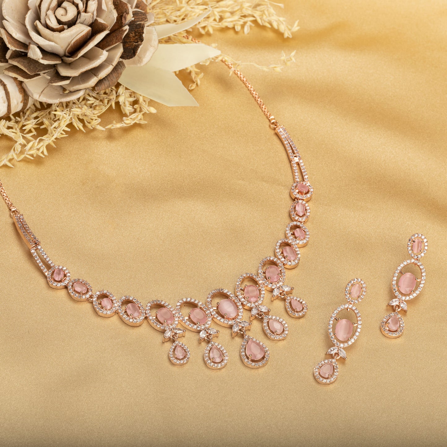 BEAUTIFUL PINK ZIRCON NECKLACE WITH A ROSE GOLD POLISH FOR A CHIC AND ELEGANT TOUCH.