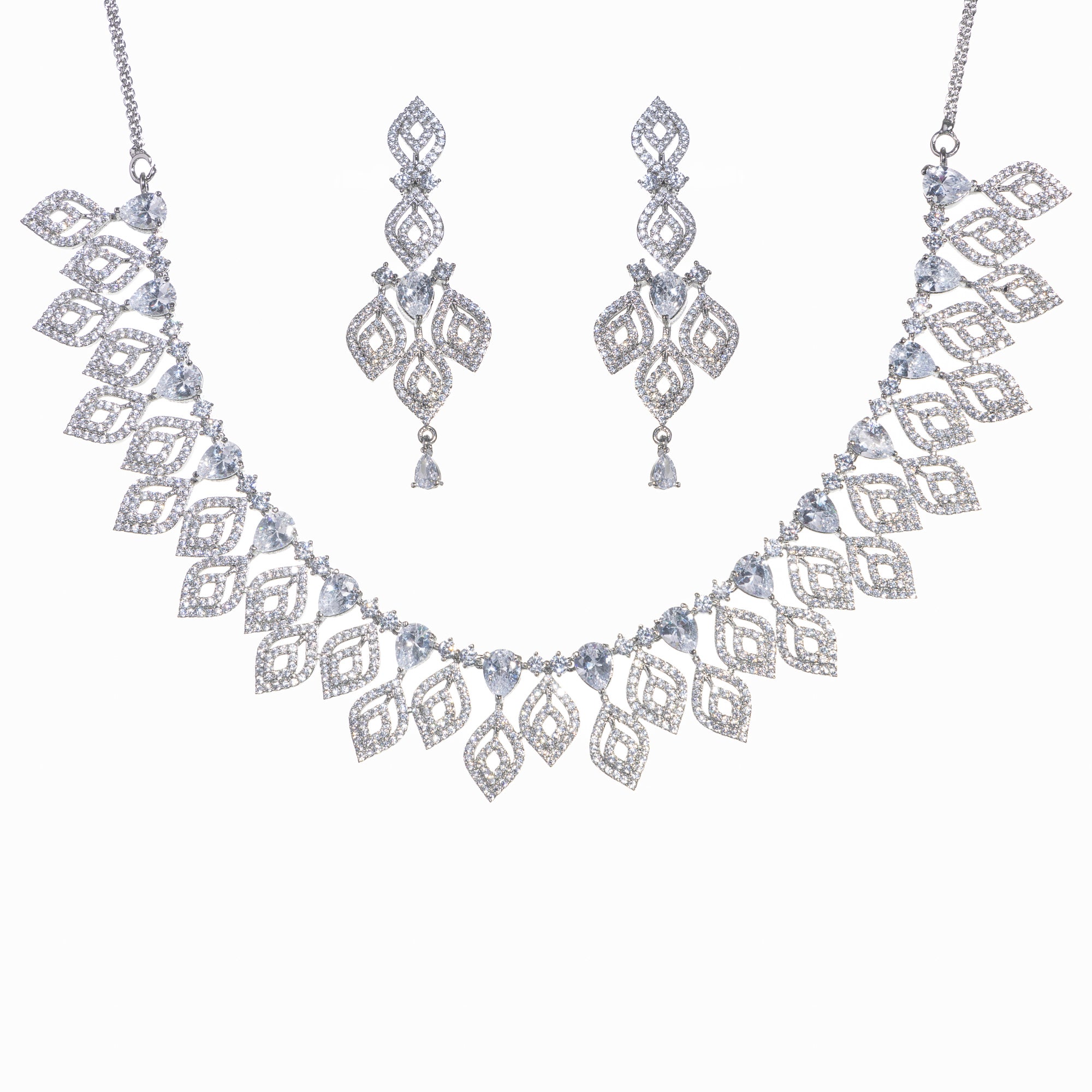 "Silver zircon necklace with leaf motifs adds natural elegance and sophisticated charm."
