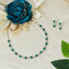 "Green stone zircon necklace adds a pop of vibrant elegance to any look."
